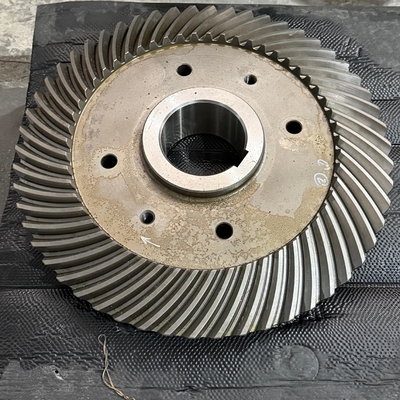 Advanced Helical Tooth Design for Reduced Noise and Enhanced Load-Bearing Capacity in Spiral Bevel Gears